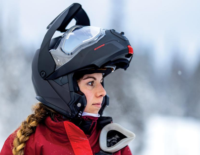 man wearing open-face helmet with a smile 